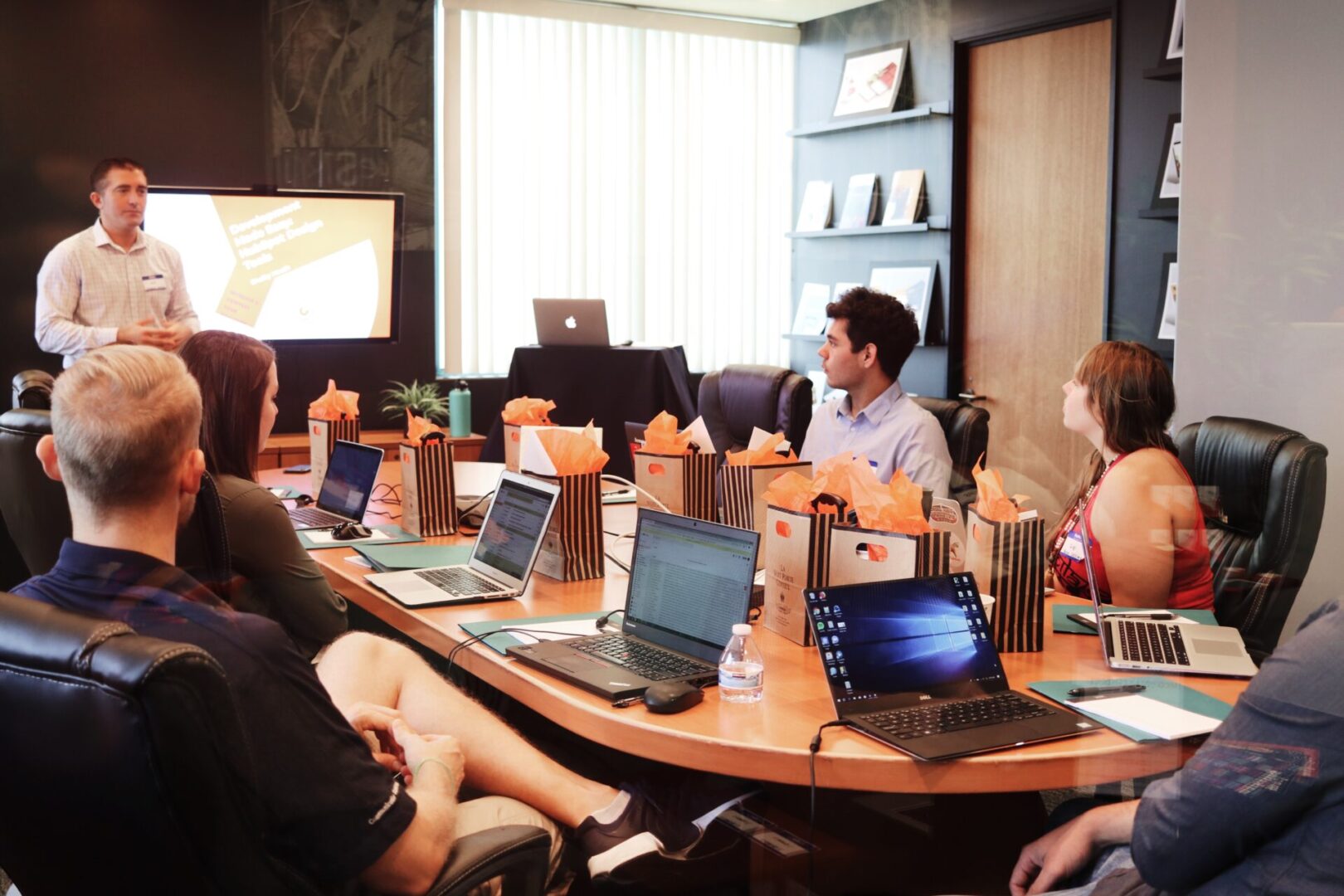 A Conference in an Office on Progress